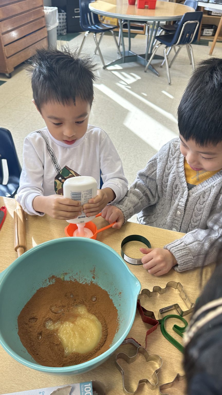 SAS English language learners dive into gingerbread lore and cookies