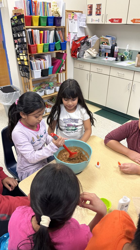 SAS English language learners dive into gingerbread lore and cookies