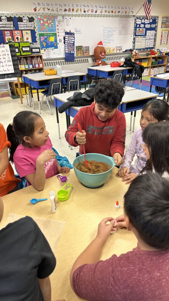 SAS English language learners dive into gingerbread lore and cookies