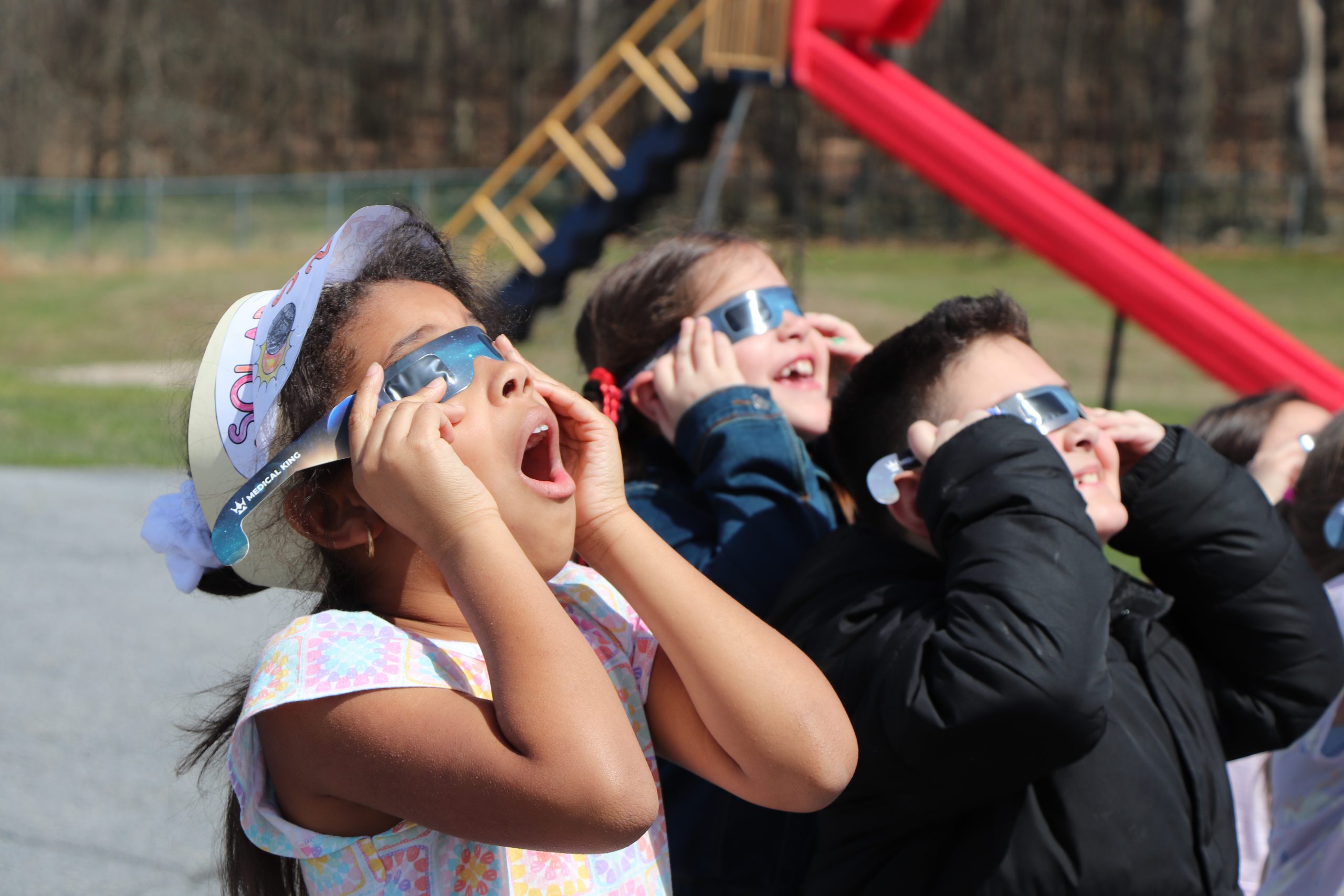 Elementary students catch a glimpse of their first eclipse