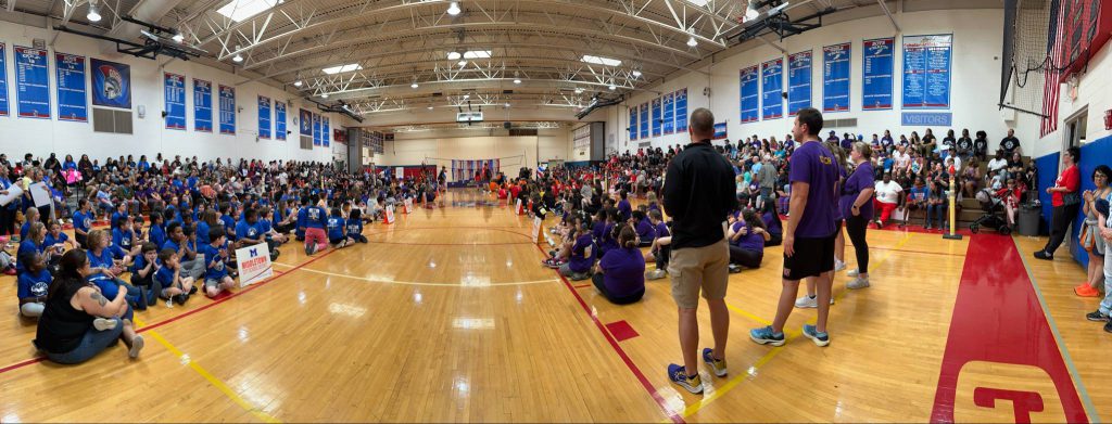 The Goshen High School gym is filled with students, coaches and families from other districts as well as Goshen.