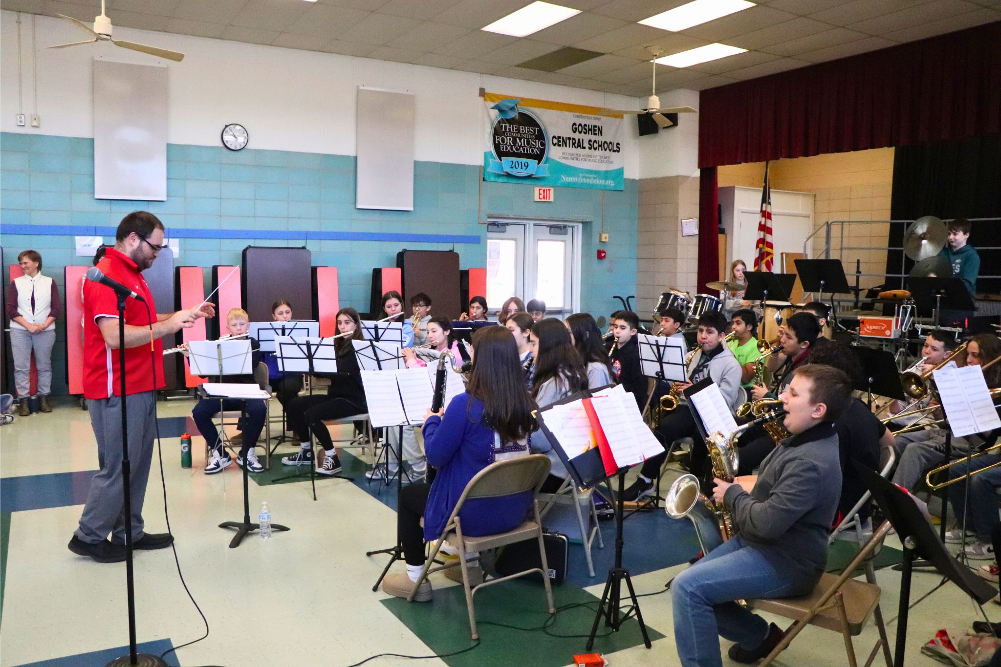 C. J. Hooker students are playing their instruments in a concert for the younger students. 