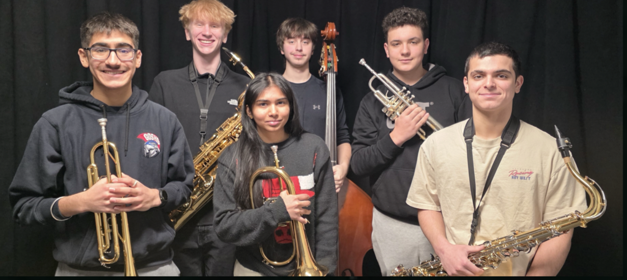 Group of students holding instruments