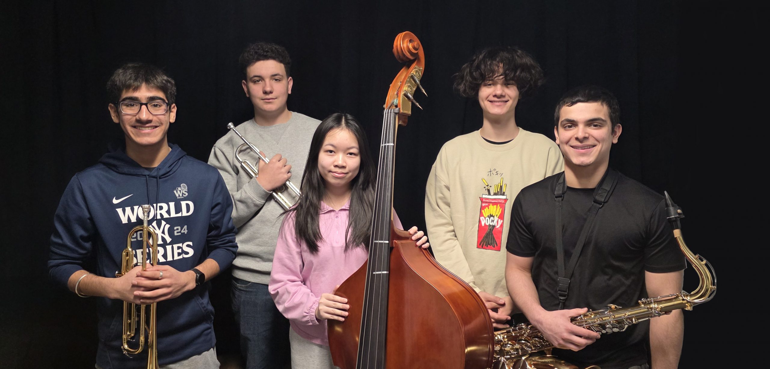 Group of students holding wind instruments
